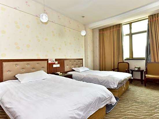 Qiha Hotel (Cixi Zhangqi Shop)