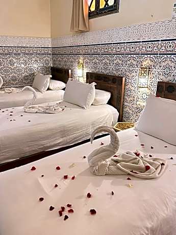 Quadruple Room with Private Bathroom