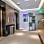Ease Hotel (Ningbo Tianyi Sqaure Jiangxiaqiao Metro Station)