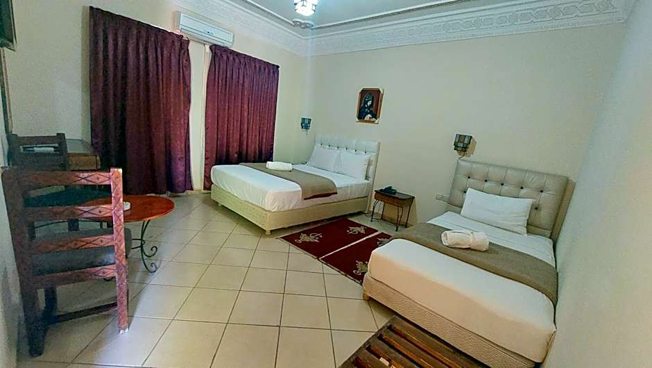 Foto 1 dari 3 — Triple Room