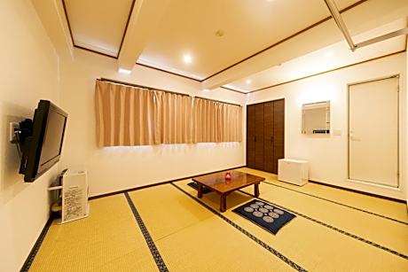 Japanese-Style Family Room with Private Bathroom and Toilet