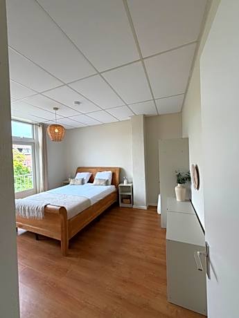 One-Bedroom Apartment with Balcony and City View