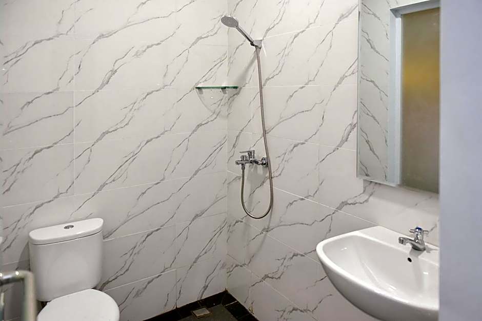 RedDoorz Plus Syariah at Lotus Residence