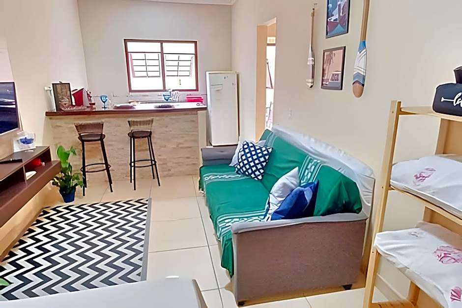 Studio pé na areia com área de churrasco privativa