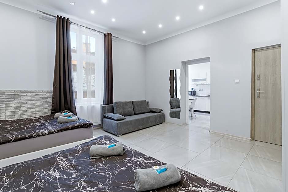 Queen Apartments
