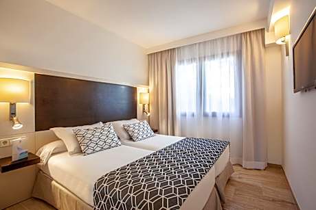 One-Bedroom Apartment with Side Sea View (2 Adults + 2 Children)