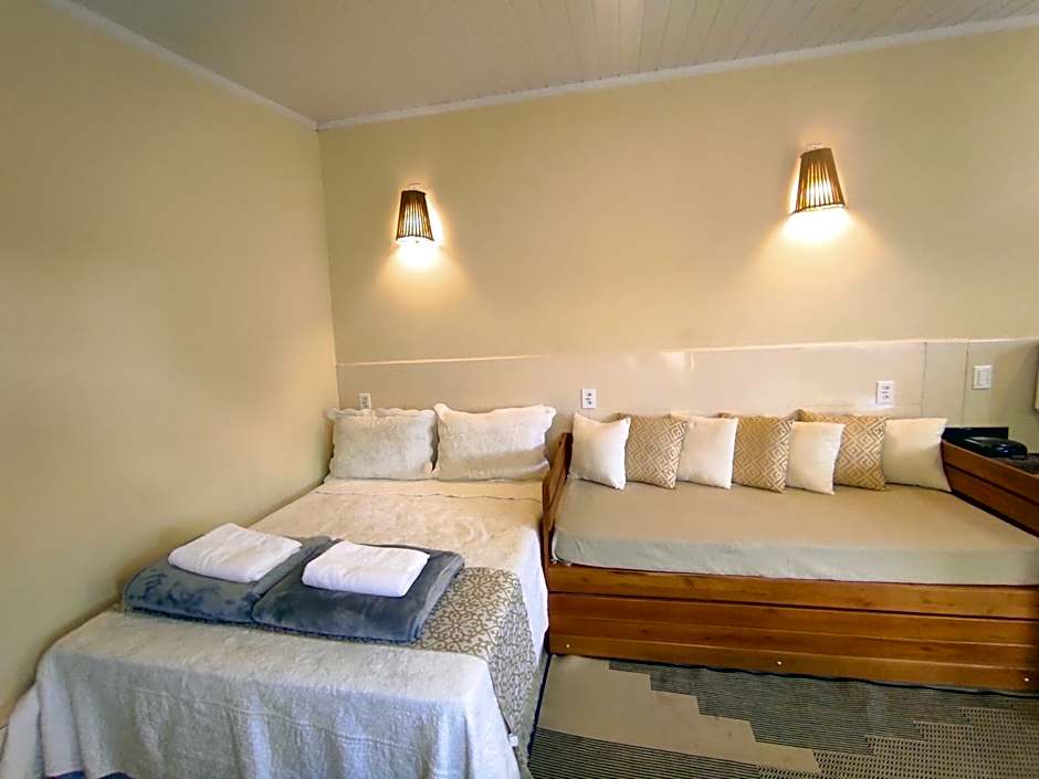 Chalé com ar condicionado e garagem