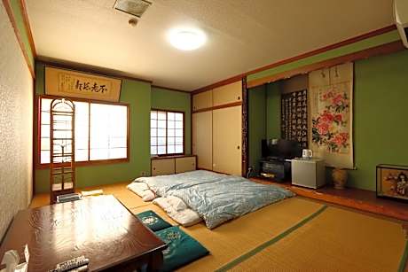 Japanese-Style Family Room with Shared Bathroom