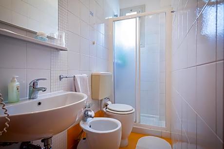 Quadruple Room (2 Adults + 2 Children)