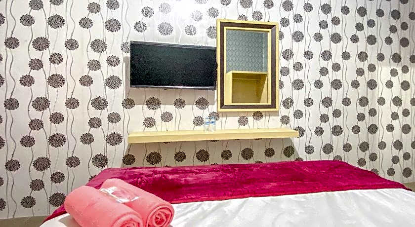 Tini's Guest House Malang Mitra RedDoorz