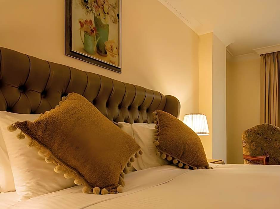 Suites at The Grand Palace Hotel