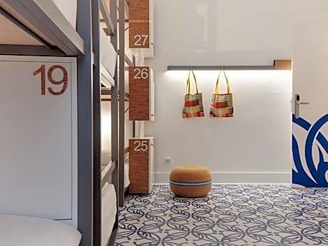 Bed in 12-Bed Female Dormitory Room