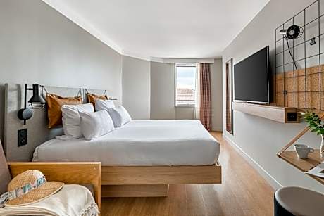 Triple Room with One Queen and Sofa Beds