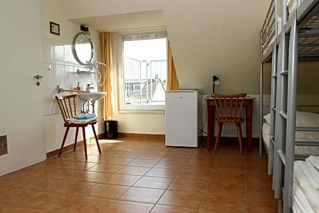Quadruple Room with Private Bathroom
