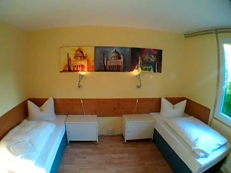 Quadruple Room with Shared Bathroom