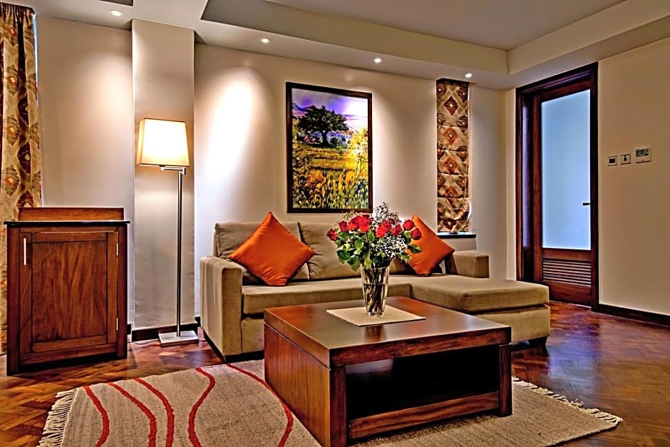 Magna Hotel and Suites