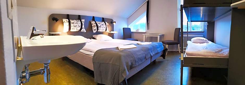 Photo 1 of 4 of Quadruple Room
