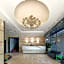 Xingyi Chain Hotel Jiangxia Metro Station