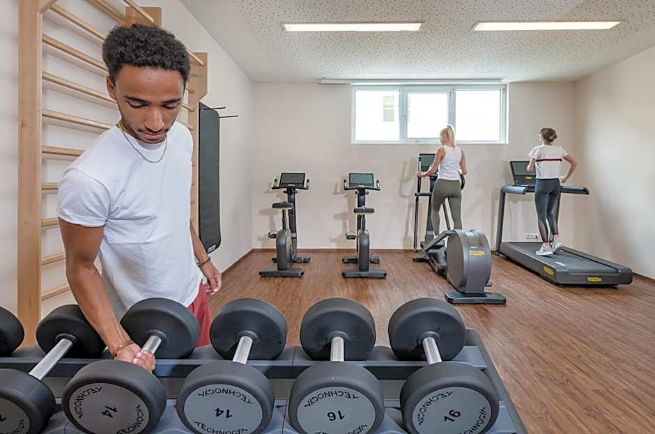 Hotel Norica - Thermenhotels Gastein mit dem Bademantel direkt in die Therme