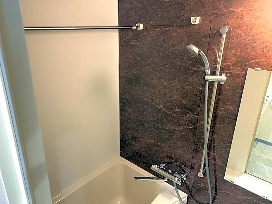 MrKINJO Miki24 in front of Makishi Station