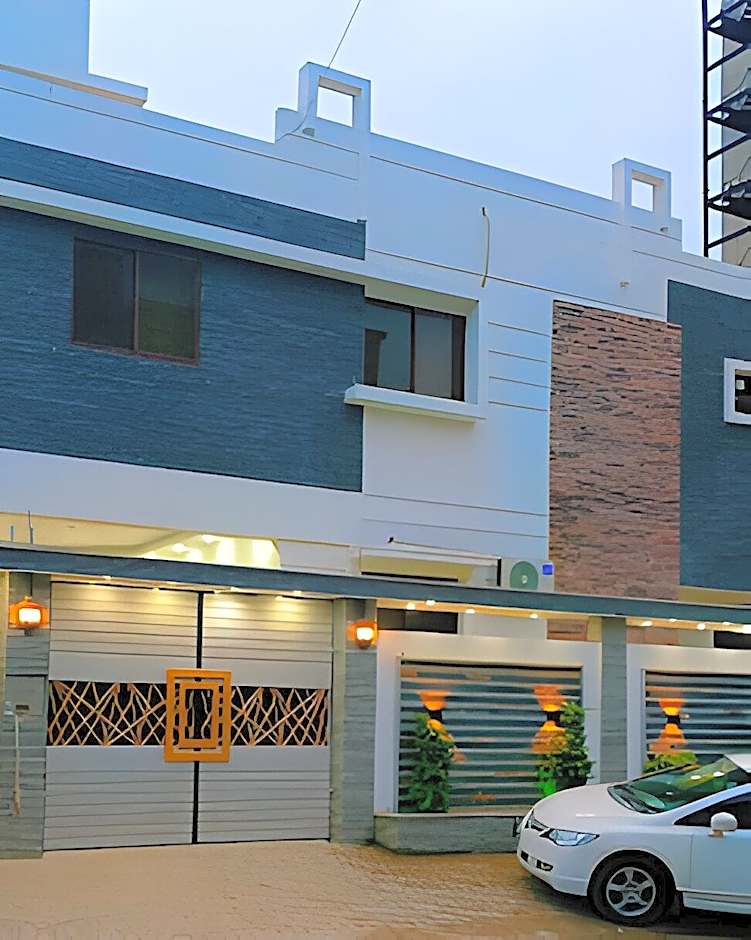 Roomi Rezidor – Karachi, TX