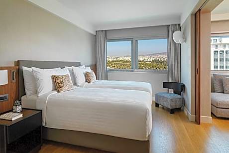Corner Suite with Twin Beds and City or Park View