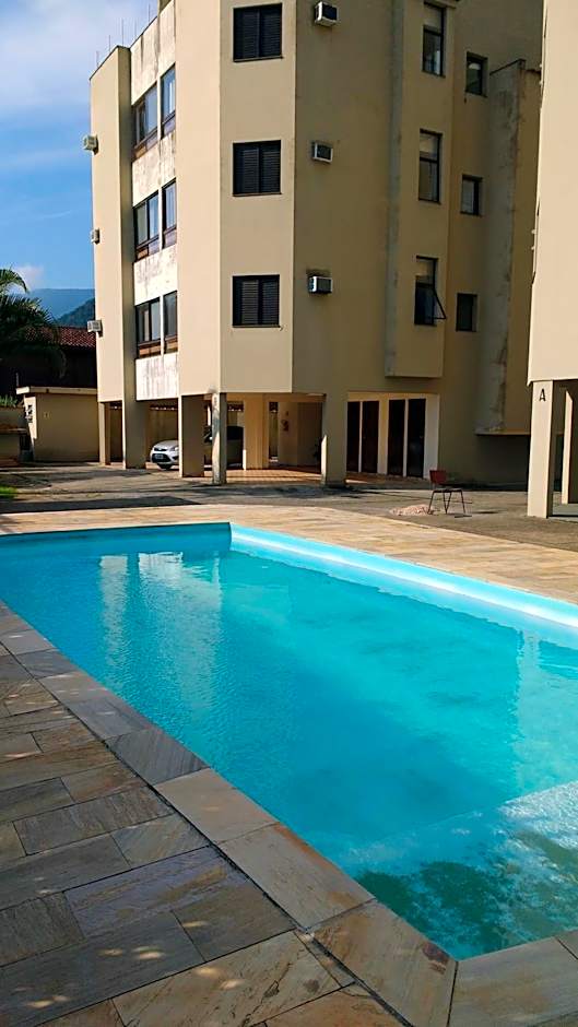 Apto lindo e aconchegante com piscina 202A