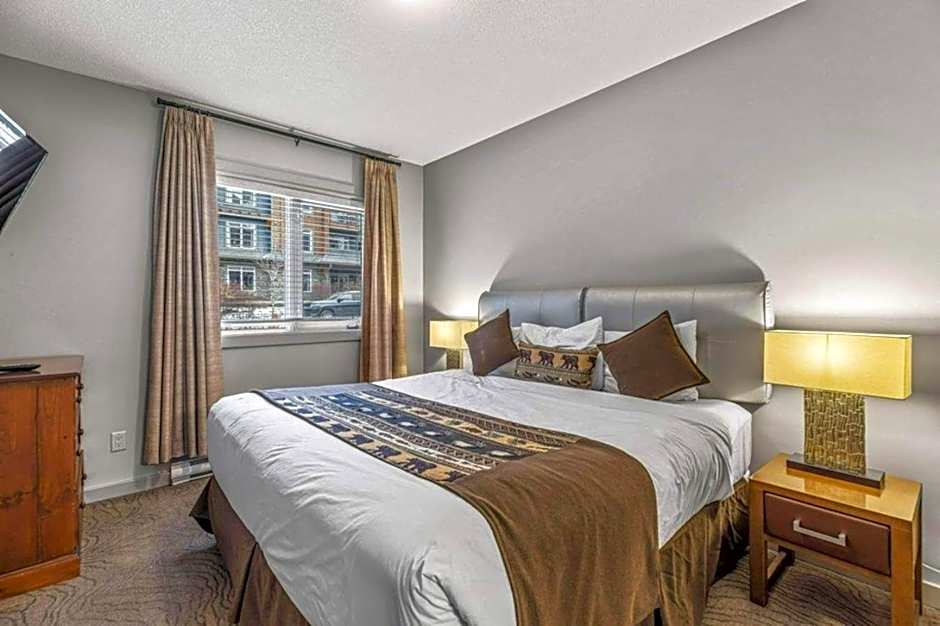 Rocky Mountain Getaway with Outdoor Heated Pool, 3 Hot Tubs, Gym, BBQ, Garage & 24 hour Reception near Banff