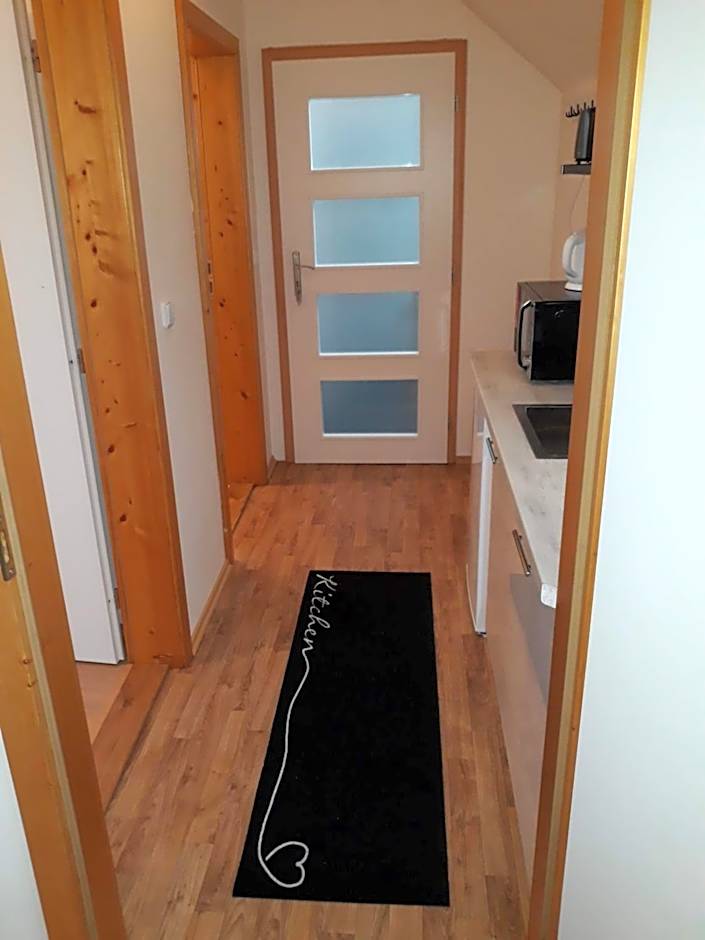 Dvoupokojový apartmán s kuchyňským koutem