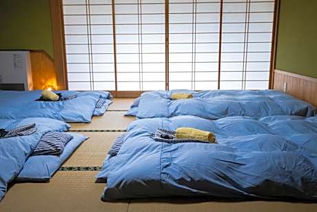 Quadruple Room with Private Bathroom