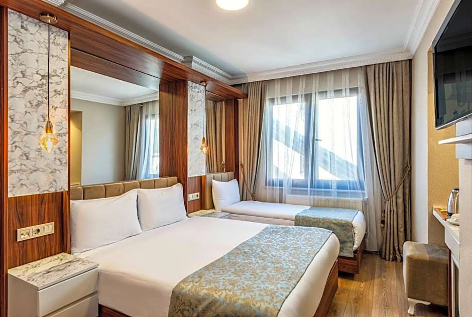 Photo 1 of 4 of Triple Room