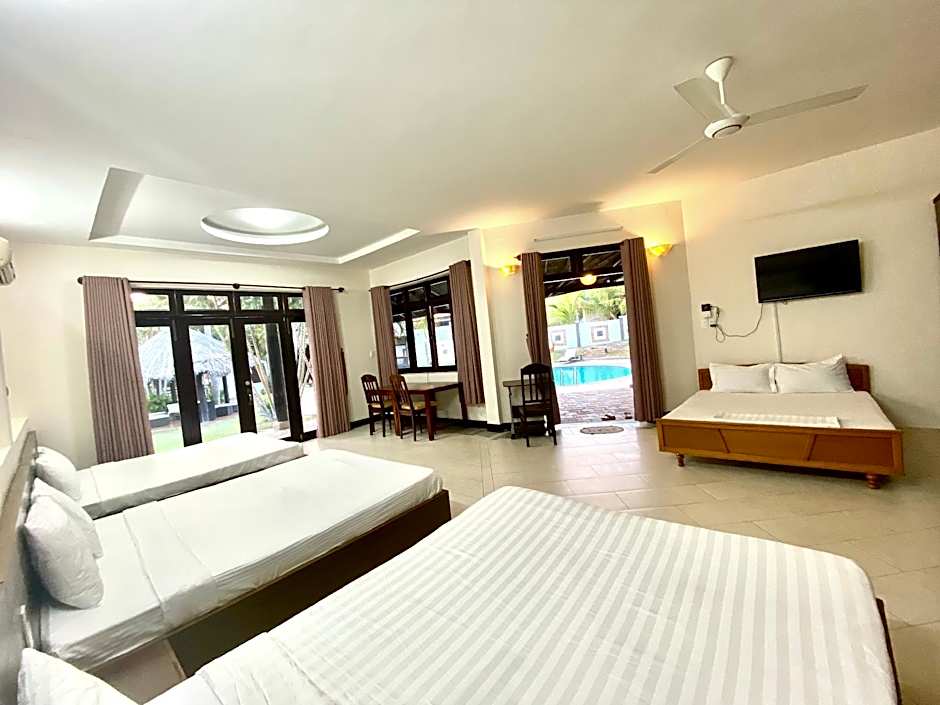 Photo 1 of 18 of Family 1 Queen Bed, Pool View