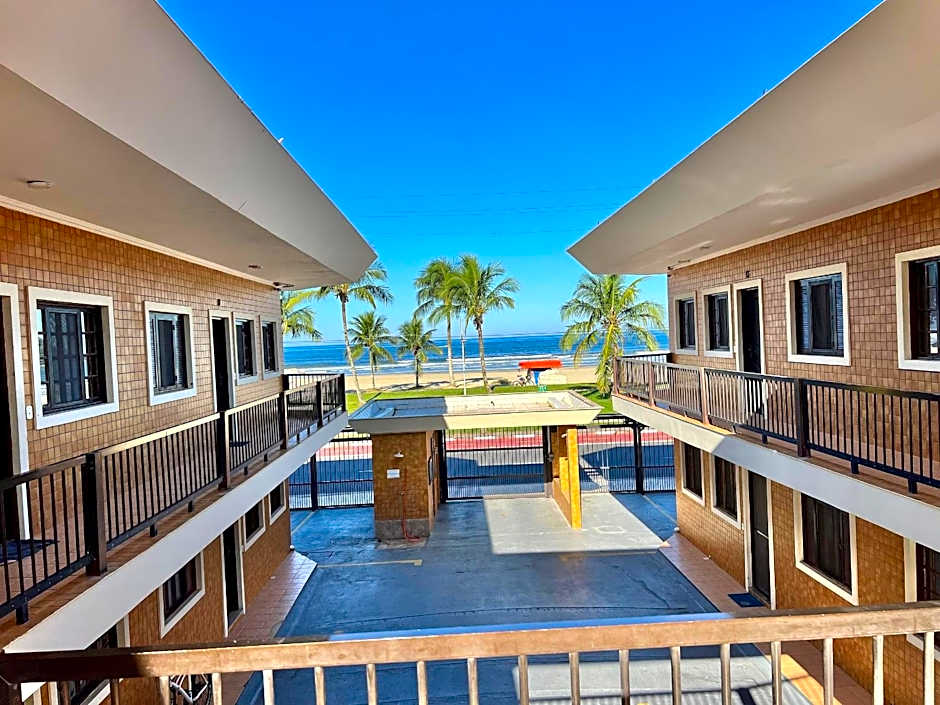 Studio pé na areia com área de churrasco privativa