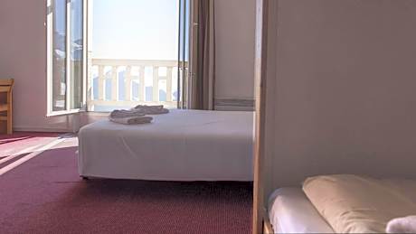 Quadruple Room with Private Bathroom