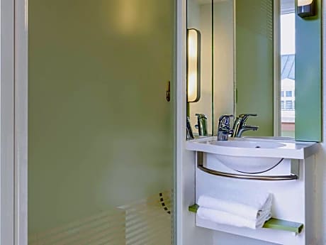 Room with One Queen Bed and One Bunk Bed