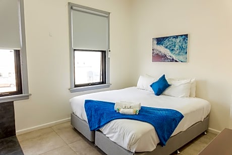 King Room with Shared Bathroom