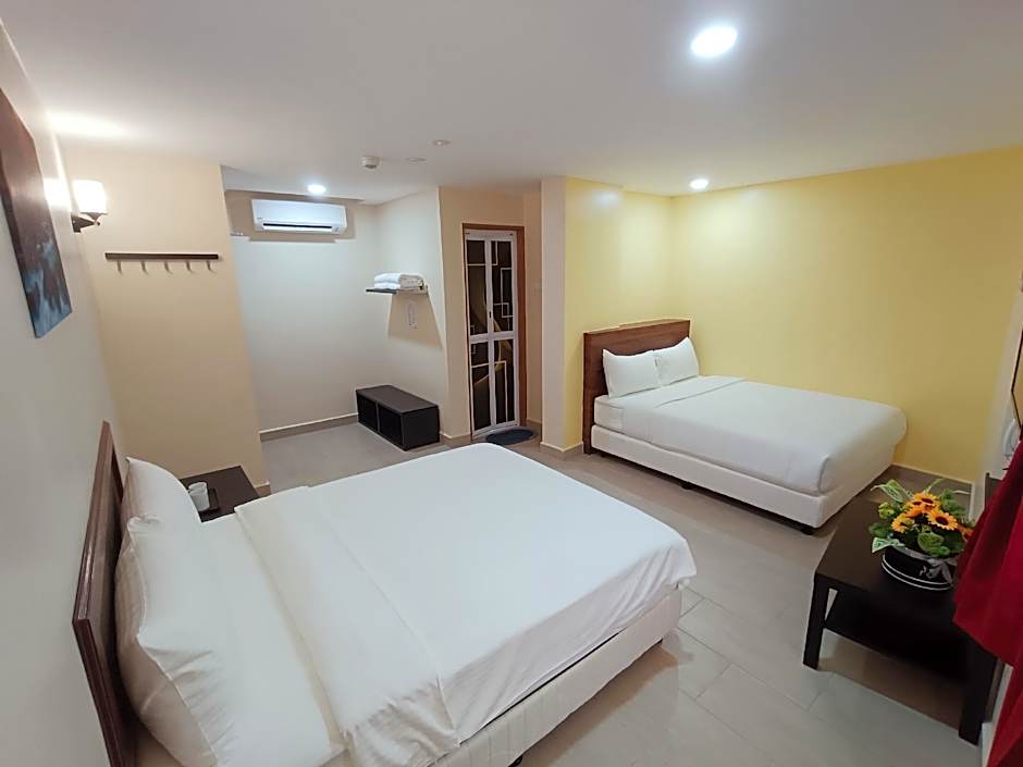 Capital O 90897 Island City Hotel