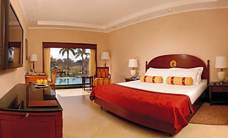 Lalit Temple view King Bed (Complimentary Welcome Drink on arrival,15% off on session of couple's Spa,15% off on session of couple's Spa, 15% off on Food & Beverage services, 15% Off on Laundry service for upto 20 clothing item)