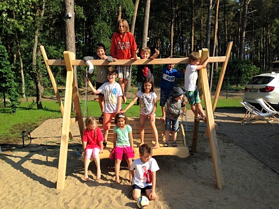 Domki Mi¿dzy Sosnami