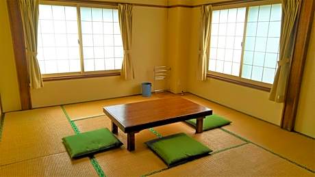 Quadruple Room with Shared Bathroom