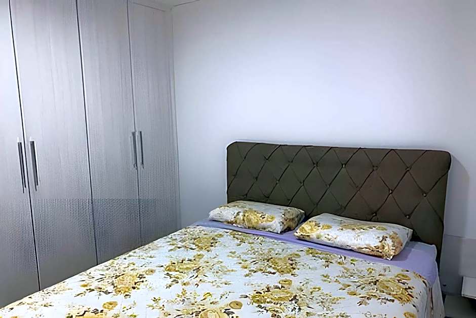 Apartamentos aconchegantes frente mar