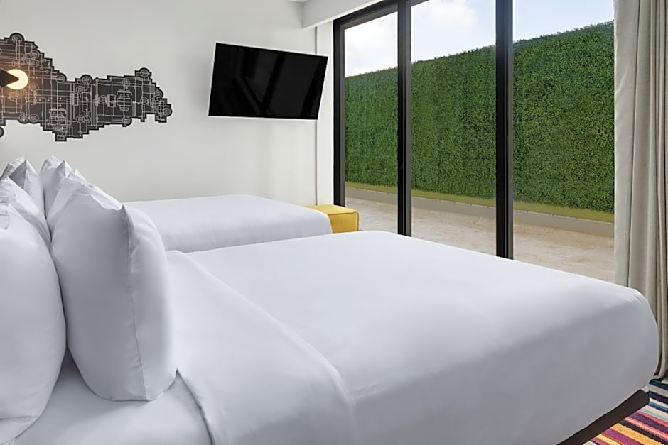 Photo 1 of 2 of 2 Queen Beds Guestroom, Partial View