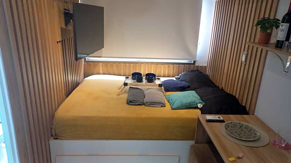 Studio aconchegante em frente a praia