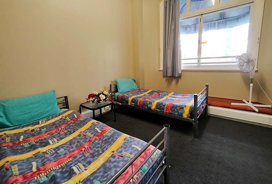 Surf 'N' Snow Backpackers Across Sky Tower