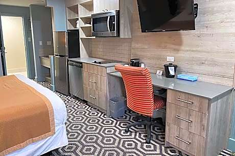 1 Queen Bed Efficiency Room Non-Smoking