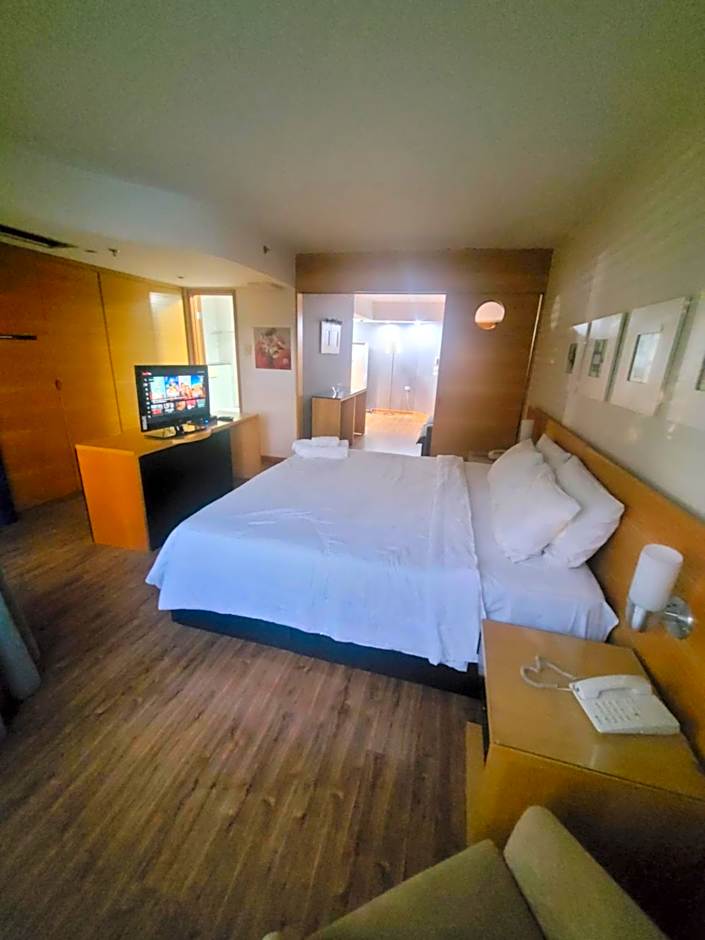 Flat no Golden Tulip By Rei dos Flats