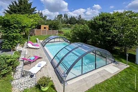 Au Coeur Du Bien Etre, chambre d'hôtes avec piscine chauffée et couverte, SPA, sauna, massages