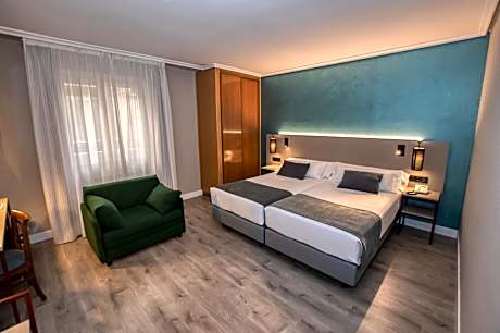 Double or Twin Room with Extra Bed (2 Adults + 1 Child)