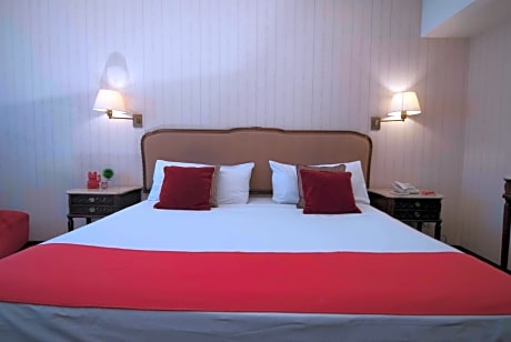 Standard - 1 King Bed and 1 Double Bed