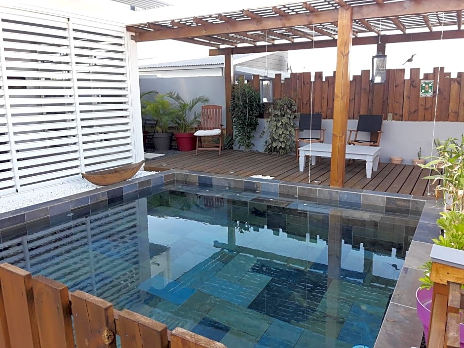 Maison TONGA piscine - jacuzzi confort
